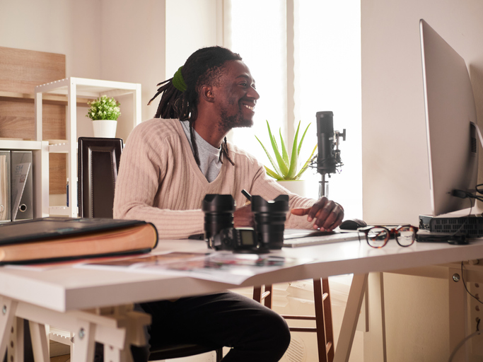 Graphic designer/photographer working in home office